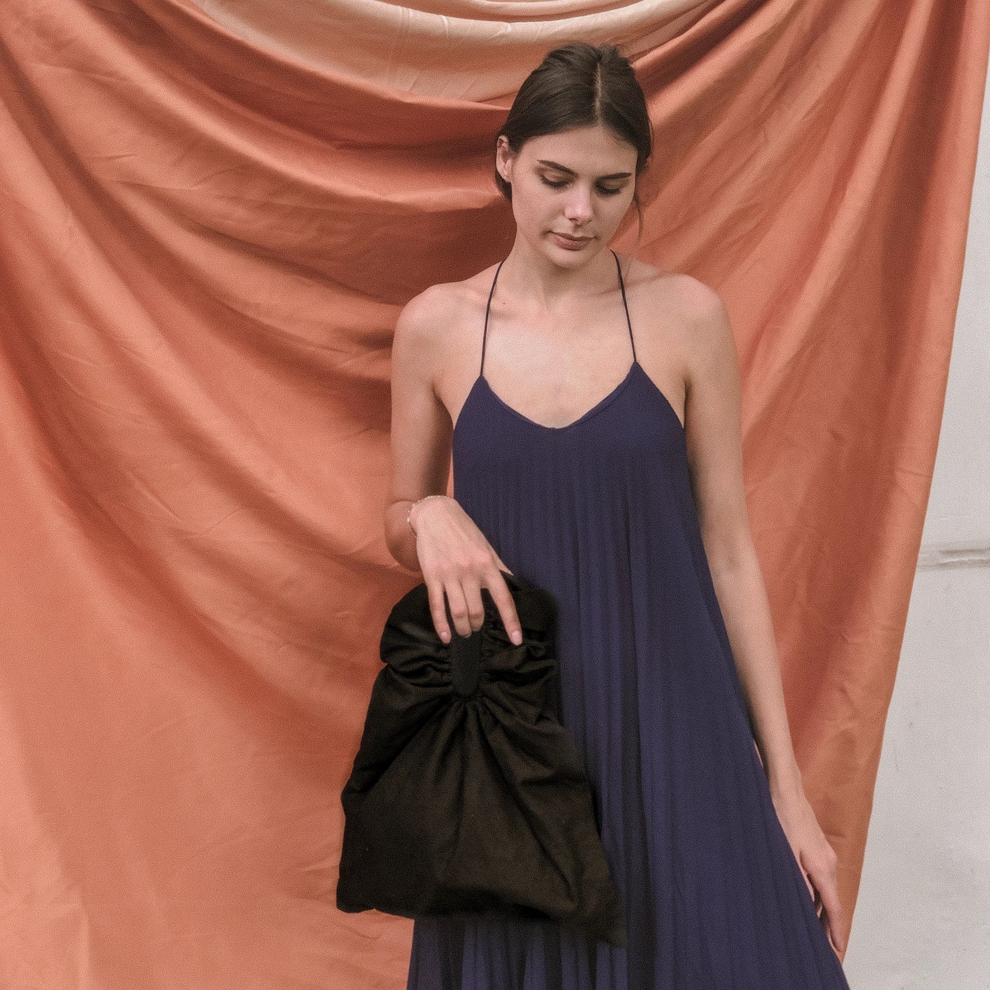 Dumpling Bag in White by Veronique