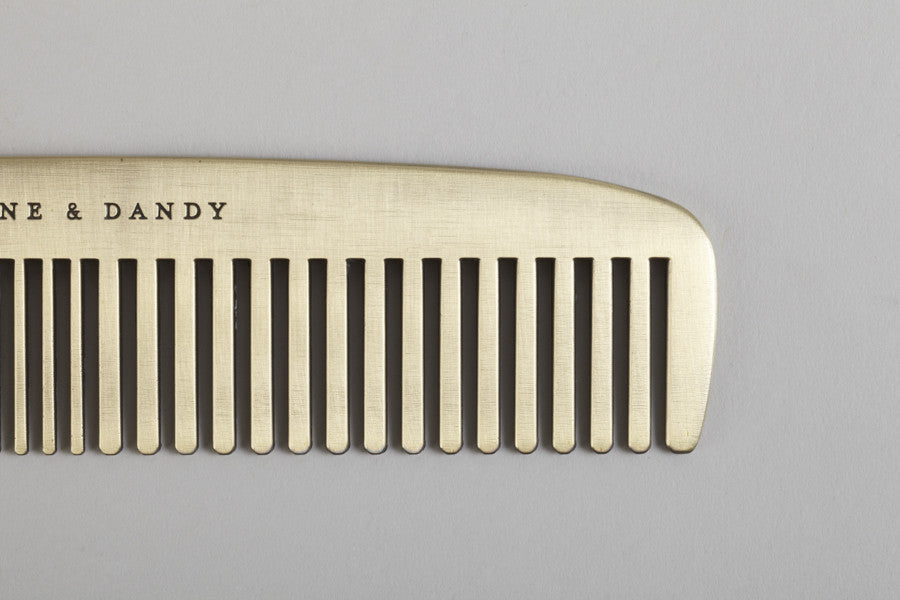 Fine and dandy brass comb