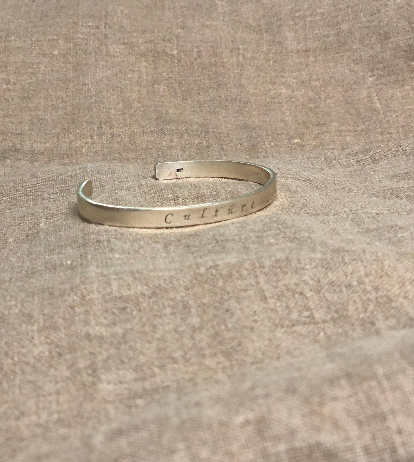 CULTURE CLASH CUFF (no image)