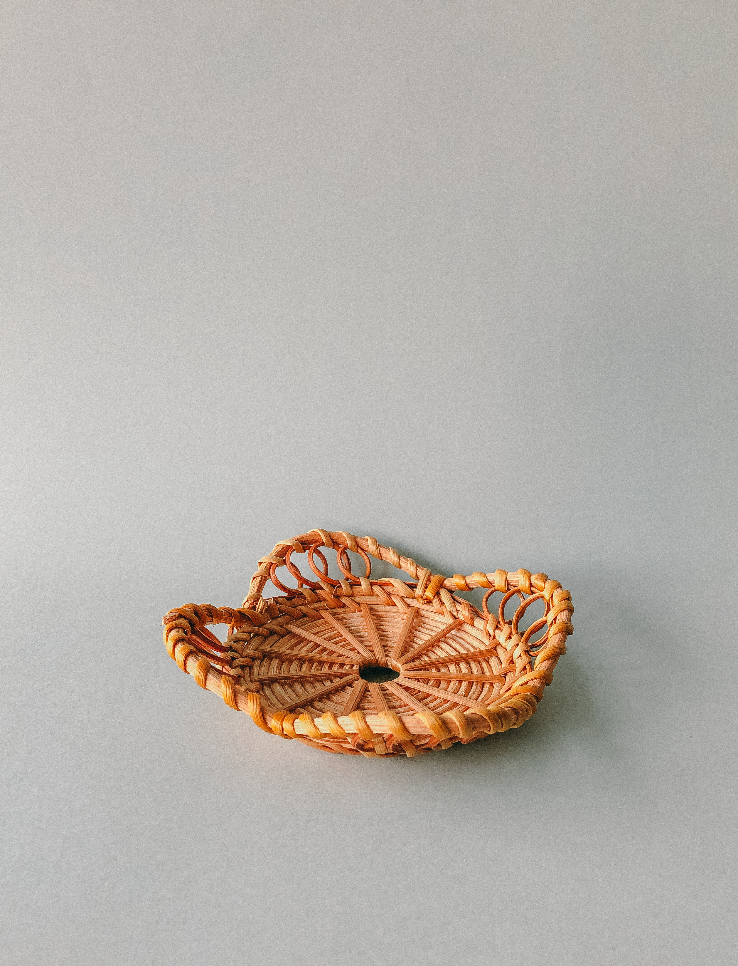 Handwoven Winged Rattan Coasters  by PROSE Tabletop